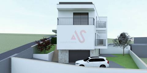 Moradia geminada T3 nova no Centro de Fafe