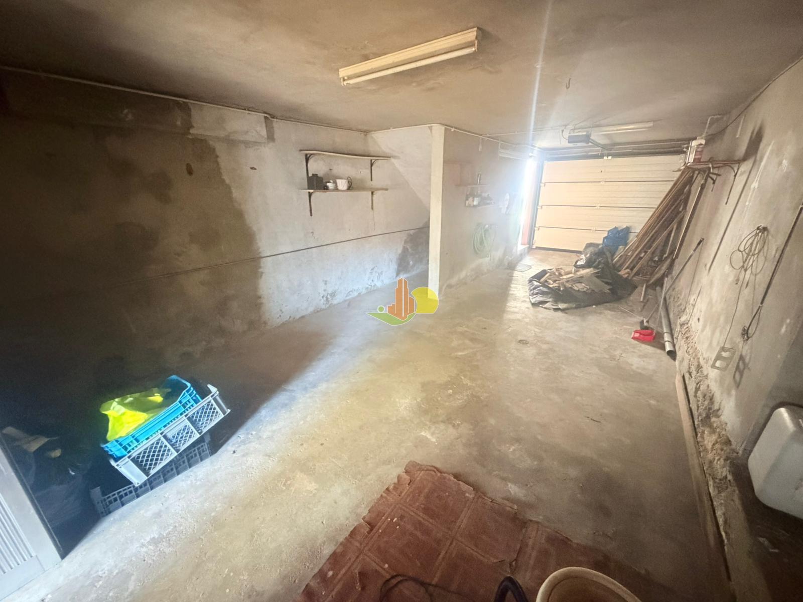 Moradia no centro da cidade com garagem