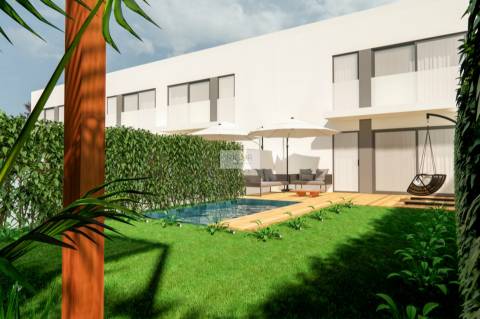 Moradia T3 de 2 frentes e jardim em construção em Águas Santas