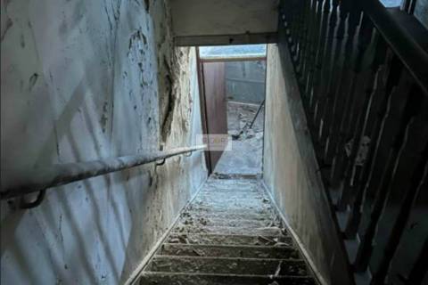 Prédio devoluto usado para indústria com destino a habitação e comércio