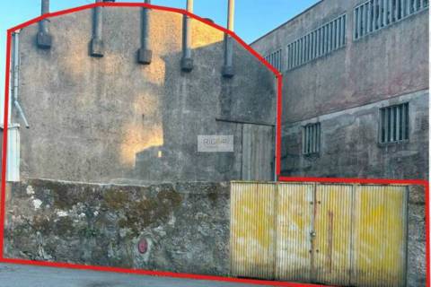 Prédio devoluto usado para indústria com destino a habitação e comércio