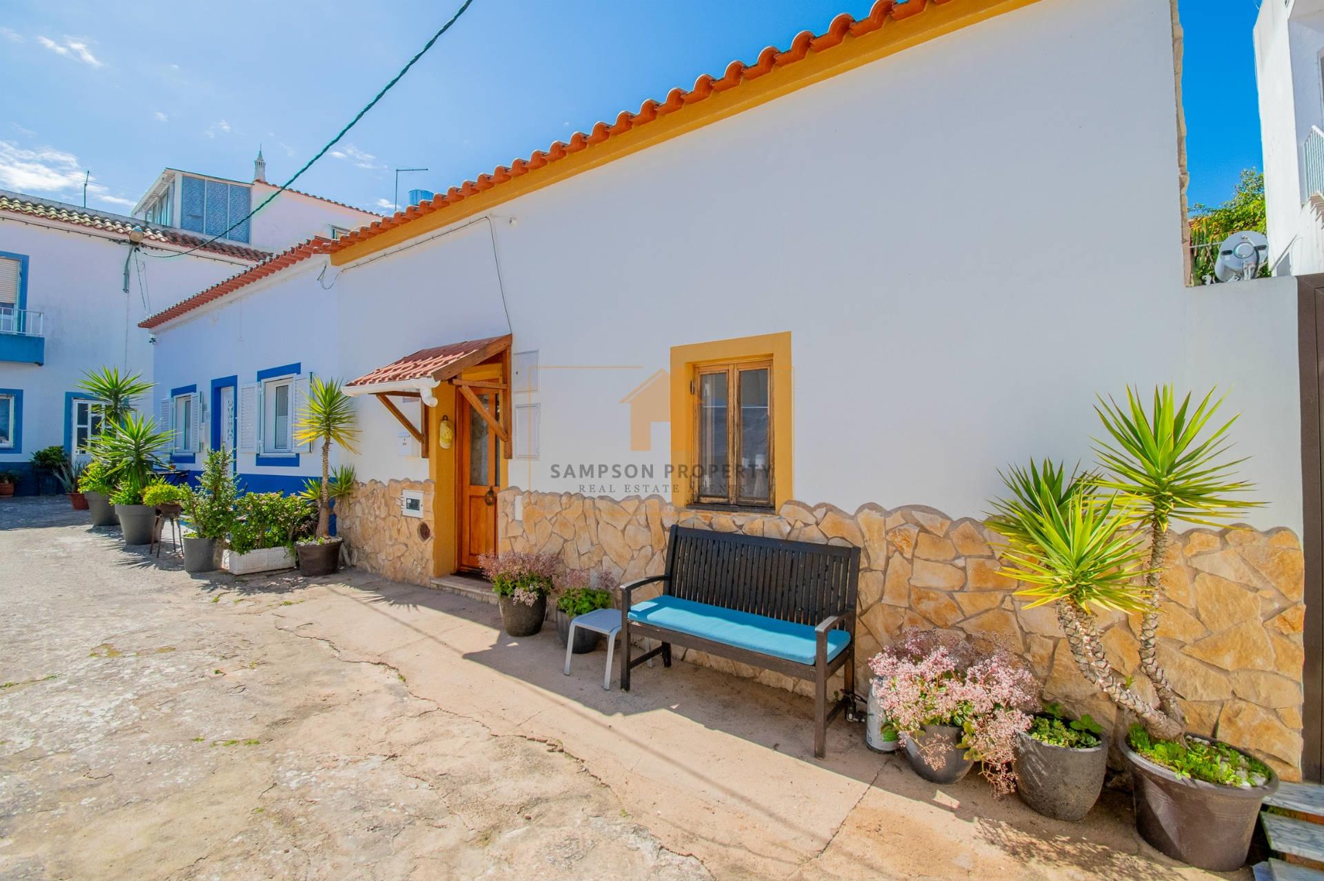 Encantadora casa de povoação T1+ 1 à venda em Ferragudo