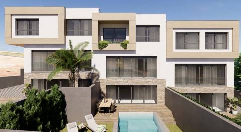 Lote de terreno com 1105m2 e projeto aprovado para 3 moradias, em São Domingos de Rana