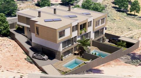 Lote de terreno com 1105m2 e projeto aprovado para 3 moradias, em São Domingos de Rana