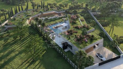 Moradia térrea implantada em 1870m2 de terreno