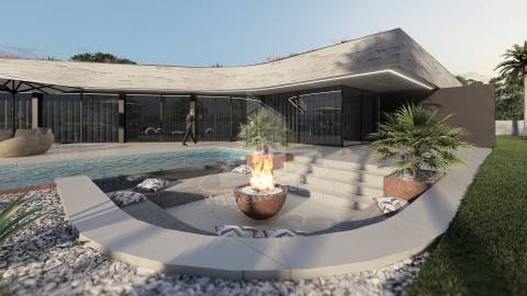 Moradia térrea implantada em 1870m2 de terreno