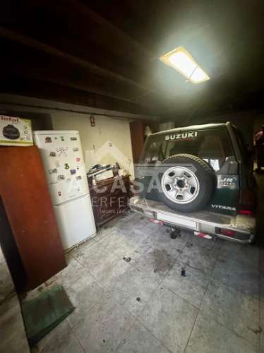 Moradia geminada T3 com garagem na cave e logradouro em São Miguel do Souto