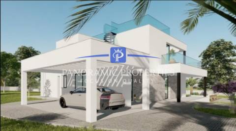 Moradia T4 contemporânea com vista panorâmica para o mar, amplos terraços e acabamentos de luxo.