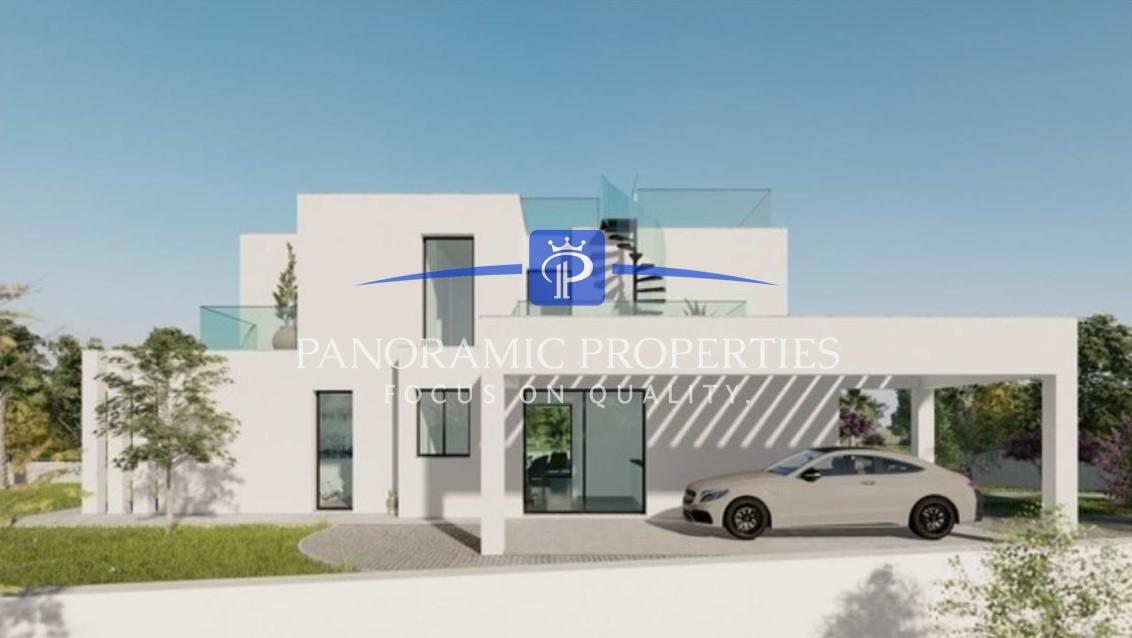 Moradia T4 contemporânea com vista panorâmica para o mar, amplos terraços e acabamentos de luxo.