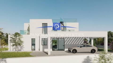 Moradia T4 contemporânea com vista panorâmica para o mar, amplos terraços e acabamentos de luxo.