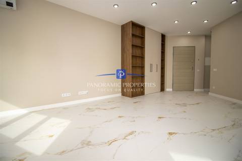 Descubra este elegante e contemporâneo apartamento de 2 quartos, localizado em Armação de Pêra