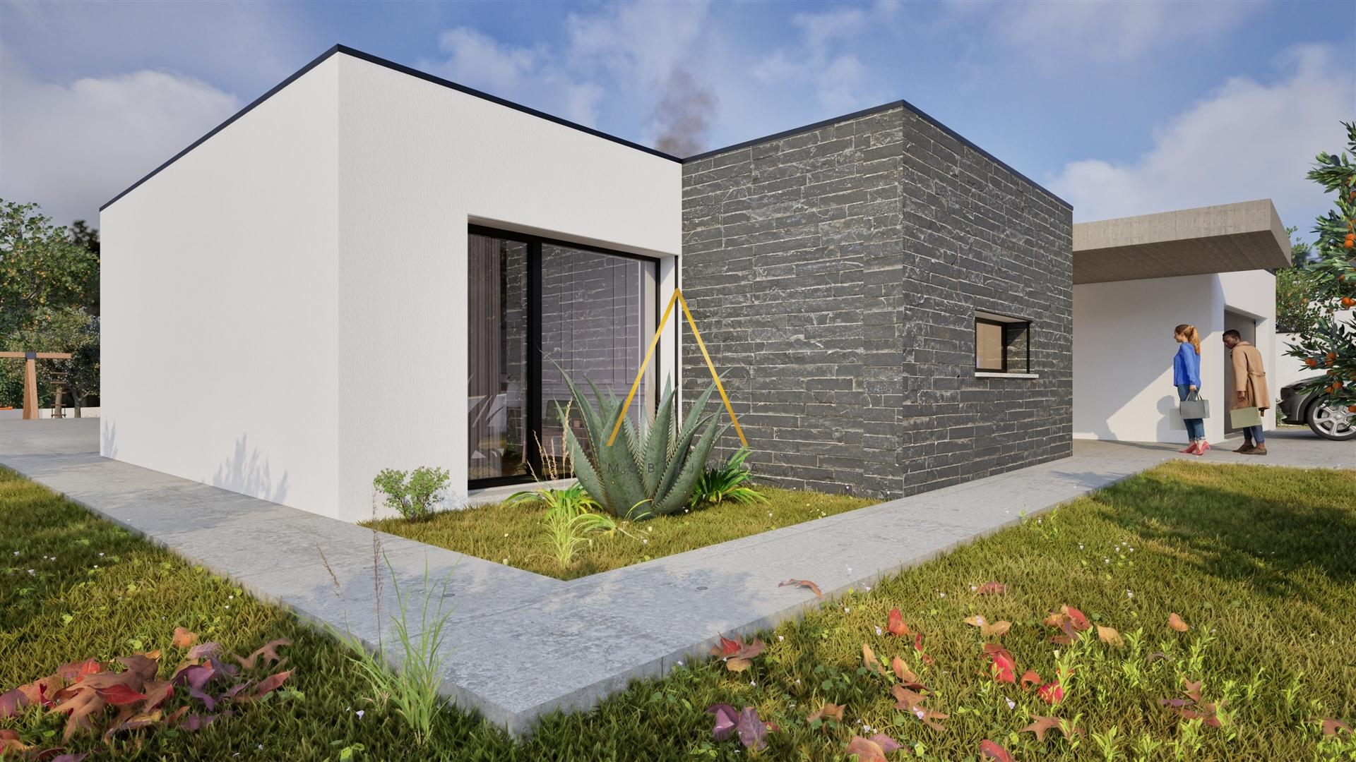 Moradia Isolada T4, inserida em 1352 m2 de terreno.