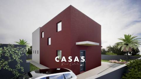 Lote de terreno com 870m2 e com projeto aprovado para construção de duas moradias na Ponta Do Pargo