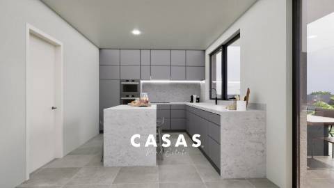 Lote de terreno com 870m2 e com projeto aprovado para construção de duas moradias na Ponta Do Pargo