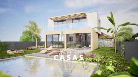 Lote de terreno com 870m2 e com projeto aprovado para construção de duas moradias na Ponta Do Pargo