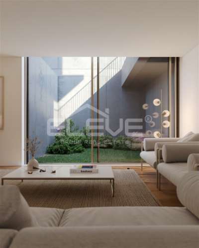 Moradia com terraço e jardim