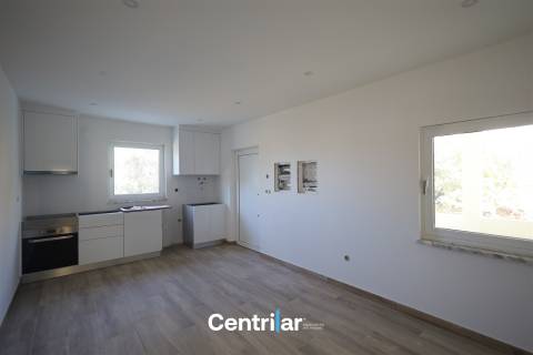 Andar Moradia T2 Remodelado no Centro de Mangualde com Jardim e Garagem