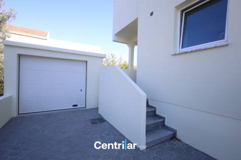 Andar Moradia T2 Remodelado no Centro de Mangualde com Jardim e Garagem