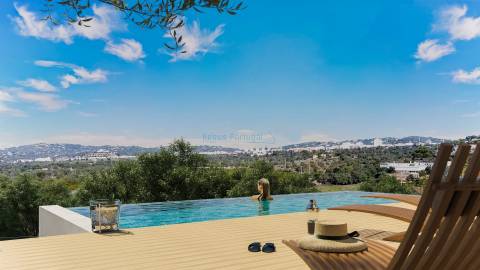 Lote com projeto aprovado para moradia T3 com piscina infinita