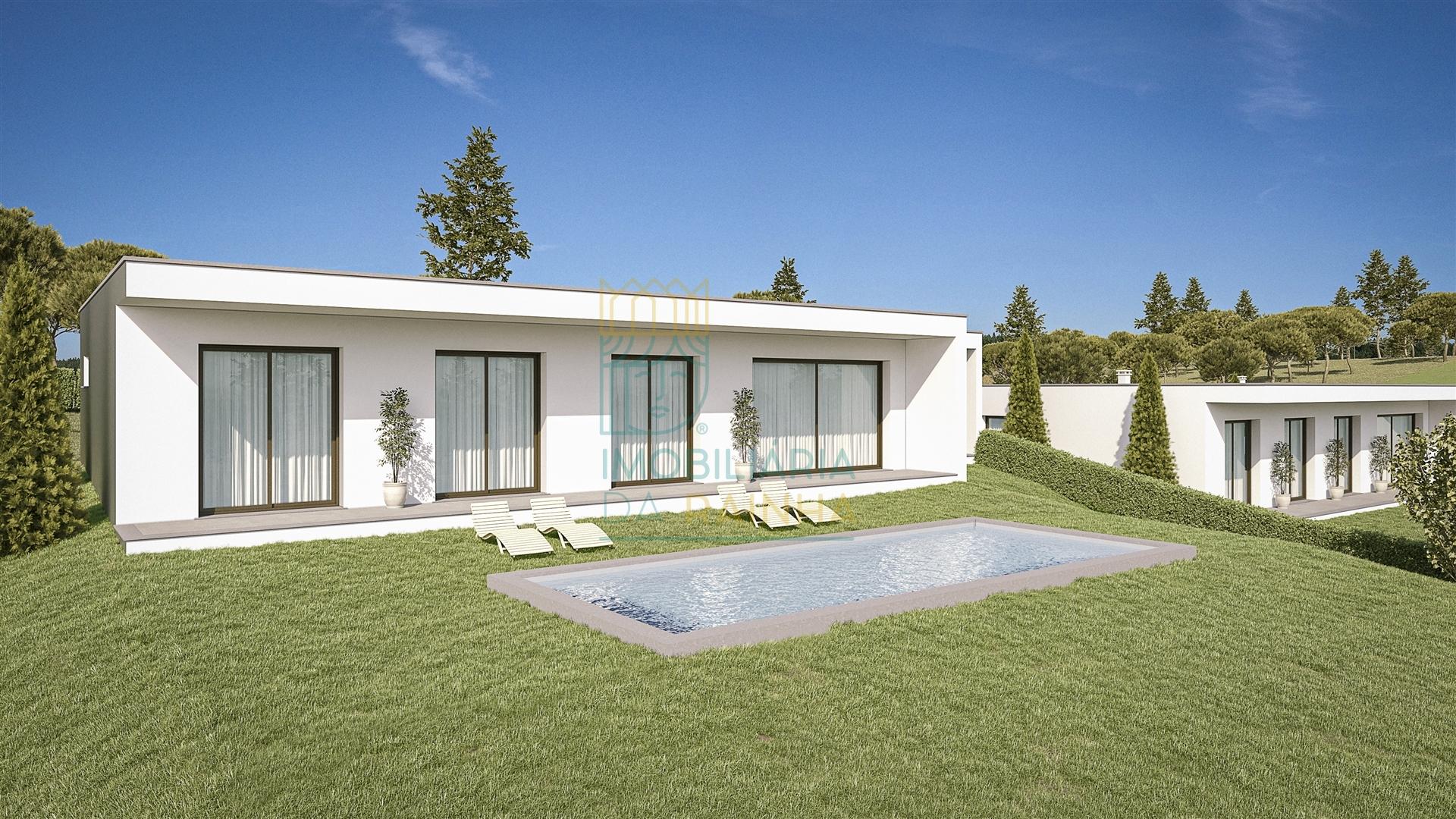 Moradia Moderna com Piscina e Garagem – Tranquilidade e Perto da Praia