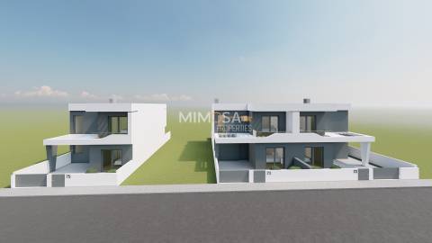 Moradia T3+1 Geminada em Construção – Estômbar
