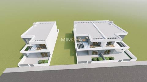 Moradia T3+1 Geminada em Construção – Estômbar