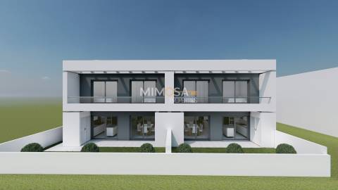 Moradia T3+1 Geminada em Construção – Estômbar