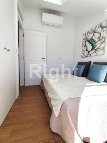 Apartamento T2 totalmente remodelado com varanda vista de Rio