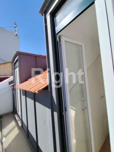 Apartamento T2 totalmente remodelado com varanda vista de Rio