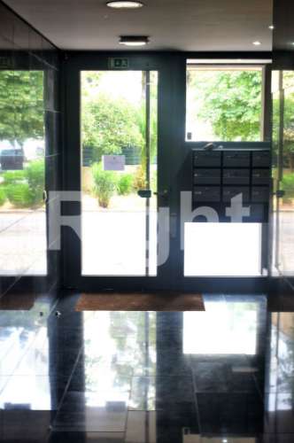 Apartamento T2 em condomínio com jardim e piscina - Benfica