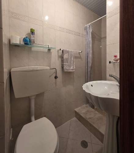 Apartamento T2 com terraço e garagem no centro de Monte Gordo, Algarve.