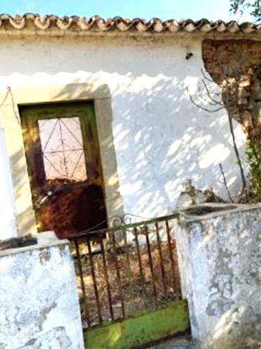 Moradia isolada - Moradia Térrea em ruinas com lote de 893m2, em Tavira.