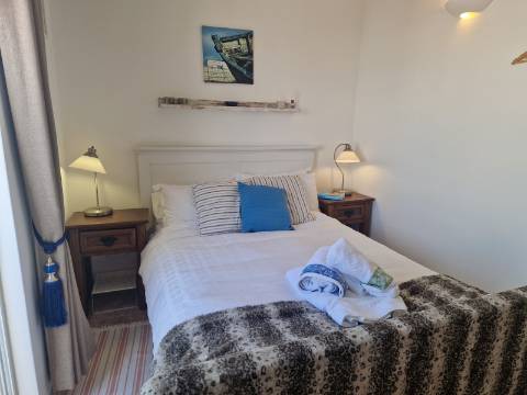 Apartamento T2 com terraço privado e suíte no centro de Olhão