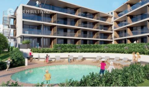 Apartamento T2 com jardim privado, piscina e garagem em Albufeira