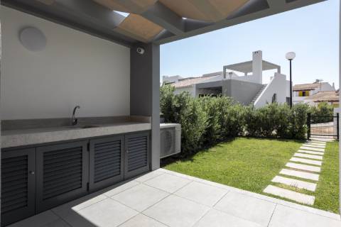 Moradia nova geminada V3 em condomínio privado - Vilamoura