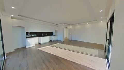 Apartamento T2 com piscina no terraço e garagem na cave - Novo - Olhão.