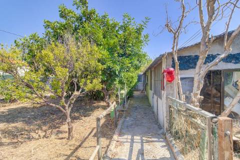 Moradia T5 com Terreno Urbano de 1.972 m² em Monte Francisco - Um Refúgio Tranquilo com Vista Aberta