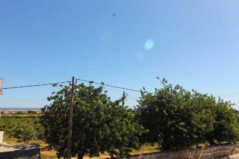 Apartamento T1, no 1.º andar com vista mar e estacionamento na cave em empreendimento com amplas áreas e linhas modernas, Tavira