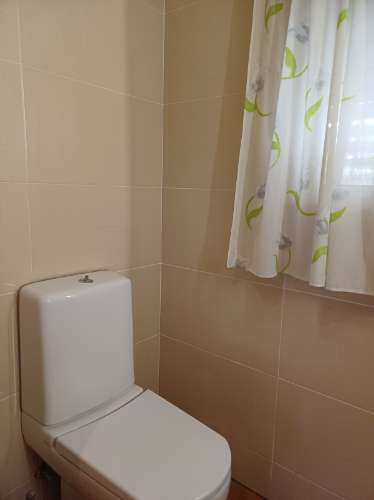 Moradia T2 em banda com Garagem , varandas e quintal com BBQ