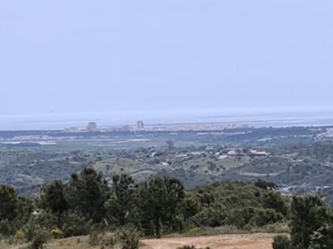 TERRENO COM 56.950 M2 - COM FURO - DEPOSITO DE ÁGUA - VISTA MAR - EM V. N. CACELA - VRSA - ALGARVE