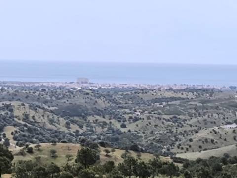 TERRENO COM 56.950 M2 - COM FURO - DEPOSITO DE ÁGUA - VISTA MAR - EM V. N. CACELA - VRSA - ALGARVE