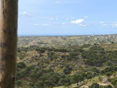TERRENO COM 56.950 M2 - COM FURO - DEPOSITO DE ÁGUA - VISTA MAR - EM V. N. CACELA - VRSA - ALGARVE