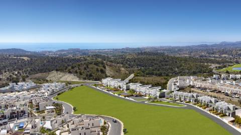 Moradia geminada T3 em construção, com parqueamento.