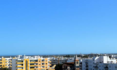 Apartamento T1 Novo com piscina, garagem e arrecadação em zona calma de Olhão