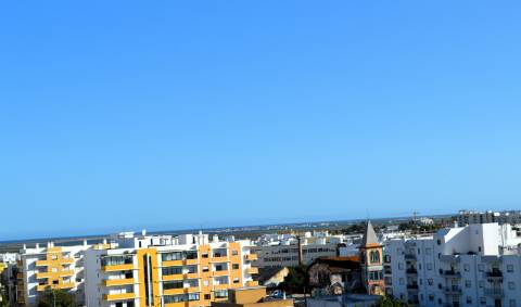 Apartamento T1 Novo com piscina, garagem e arrecadação em zona calma de Olhão