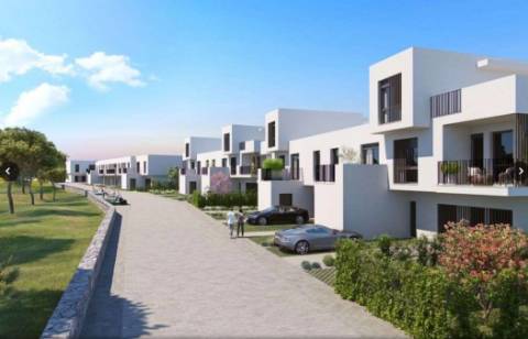 Moradia em banda T4, com parqueamento para 2 carros..