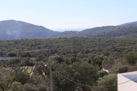 Apartamento T4 com exposição solar a sul e vistas de campo e mar, em S. Brás de Alportel