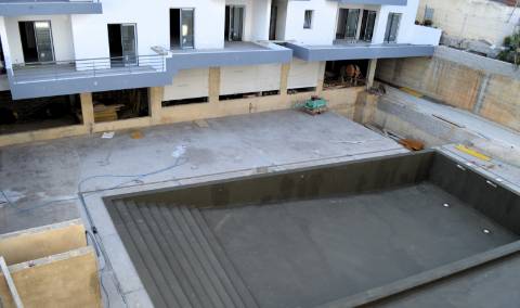 Apartamento T2 Novo com piscina, garagem e arrecadação em Olhão