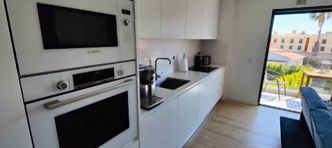 Excelente apartamento T2 Novo em condomínio fechado com Piscina e lugar de garagem.