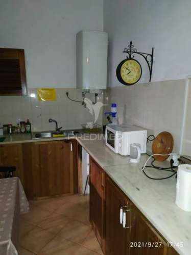 Alojamento local em casa senhorial com restaurante e loja individual